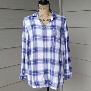 Blue and white botton up polo shirt